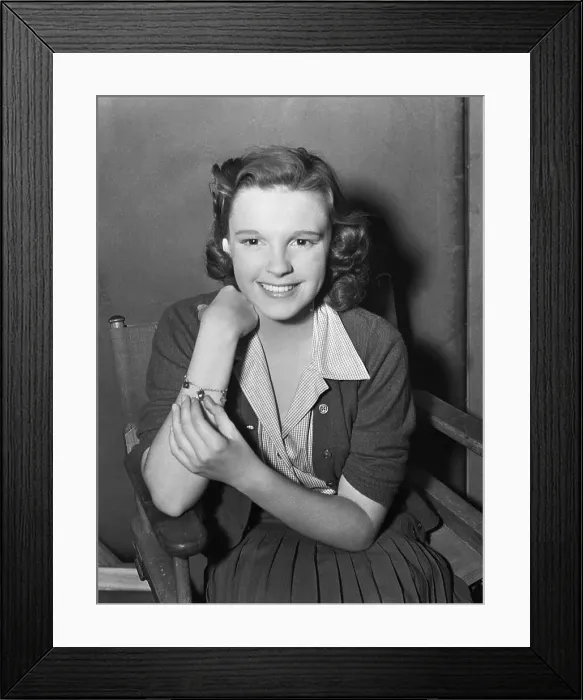 Framed Print : Judy Garland Posing While Sitting Framed Print : Judy Garland Posing While Sitting