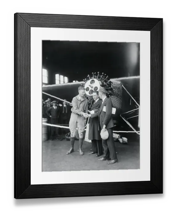 Framed Print : Charles Lindbergh Posing With Two Entries for Transatlantic Race Framed Print : Charles Lindbergh Posing With Two Entries for Transatlantic Race