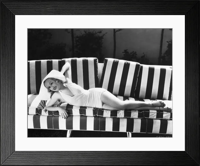 Framed Print : Carole Lombard Lounging on Couch Framed Print : Carole Lombard Lounging on Couch