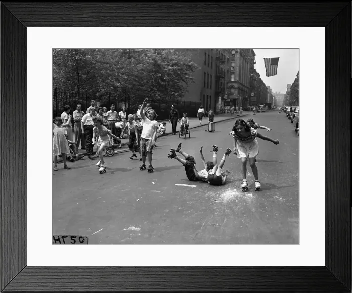 Framed Print : Kids (8-9, 10-12) rollerskating on street Framed Print : Kids (8-9, 10-12) rollerskating on street