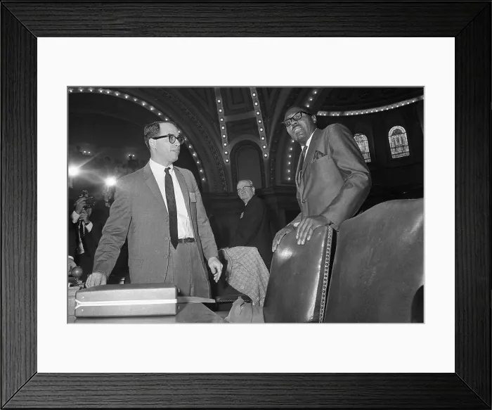 Framed Print : Robert G. Clark Standing over Chair Framed Print : Robert G. Clark Standing over Chair