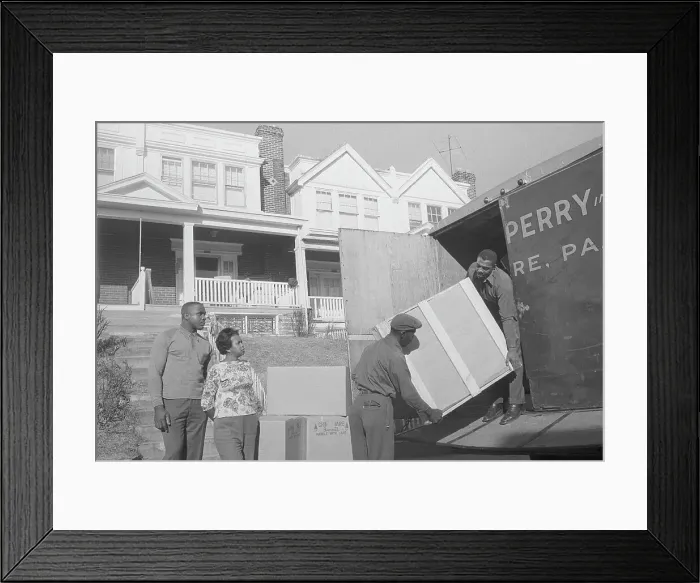 Framed Print : Boxing Champion Sonny Liston and Wife Guiding Movers at Van Framed Print : Boxing Champion Sonny Liston and Wife Guiding Movers at Van