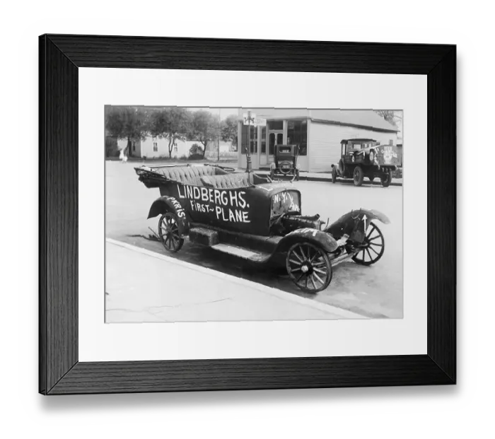 Framed Print : Early Model Car Parked at Station