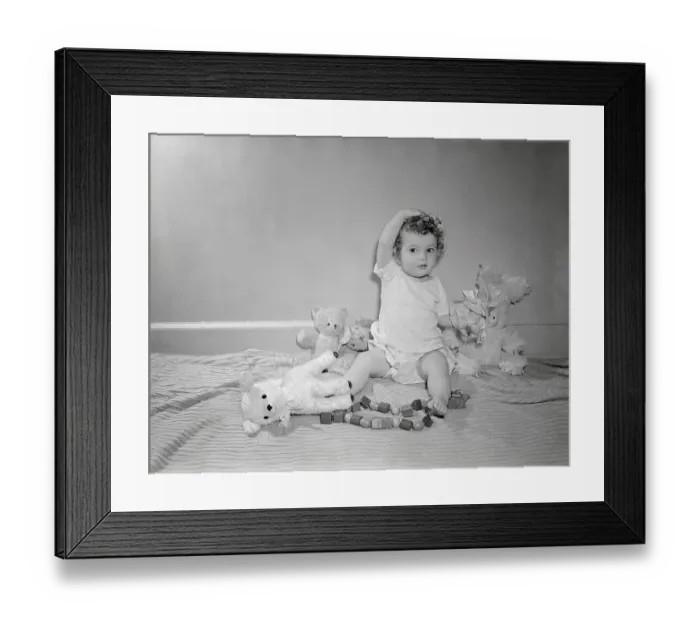 Framed Print : Girl (2-3) playing with toys