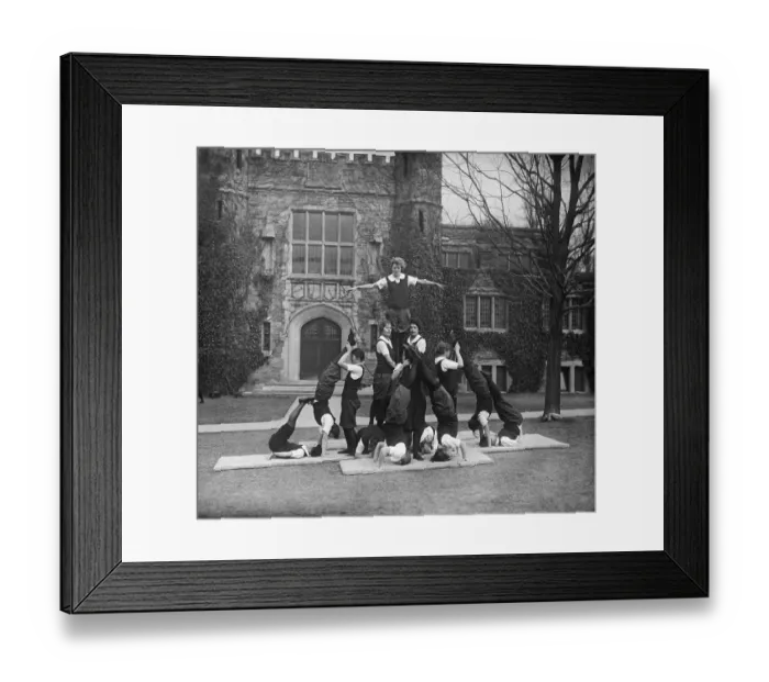 Framed Print : College students performing acrobatic activities Framed Print : College students performing acrobatic activities