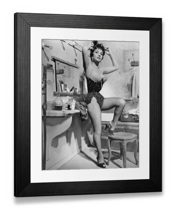 Framed Print : Actress Gina Lollobrigida Posing on Stool Framed Print : Actress Gina Lollobrigida Posing on Stool