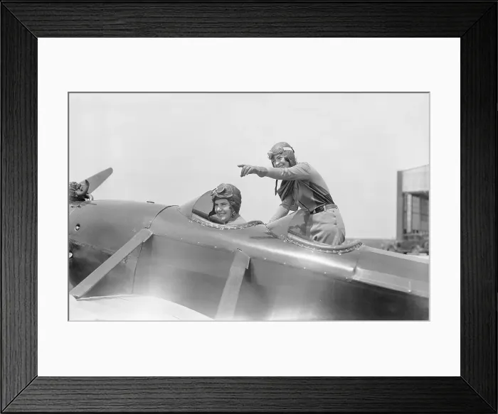 Framed Print : Flapper Girl Receiving Flying Lesson Framed Print : Flapper Girl Receiving Flying Lesson