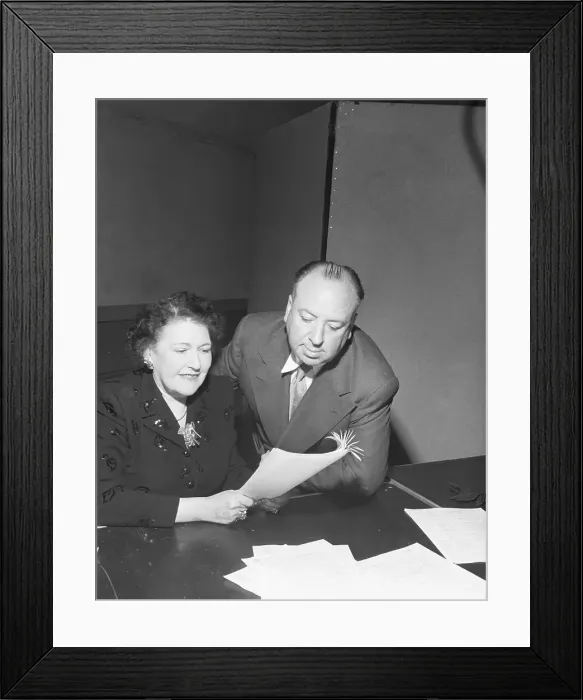 Framed Print : Hitchcock Reads Script With L Parsons