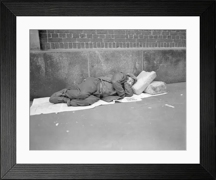 Framed Print : Homeless Man Sleeping on Street Framed Print : Homeless Man Sleeping on Street