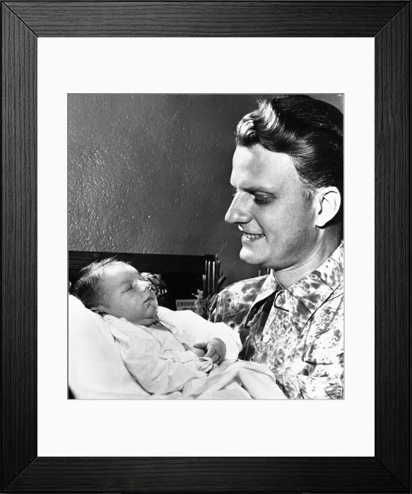 Framed Print : Billy Graham Holding Baby Son Framed Print : Billy Graham Holding Baby Son