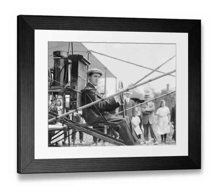 Framed Print : Man Sitting in Early Airplane Framed Print : Man Sitting in Early Airplane