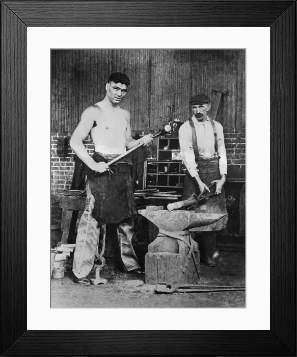 Framed Print : Jack Dempsey Holding a Hammer Framed Print : Jack Dempsey Holding a Hammer