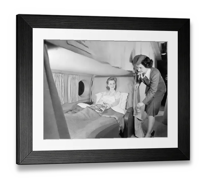 Framed Print : Flight Attendant W / Reclining Passenger Framed Print : Flight Attendant W / Reclining Passenger