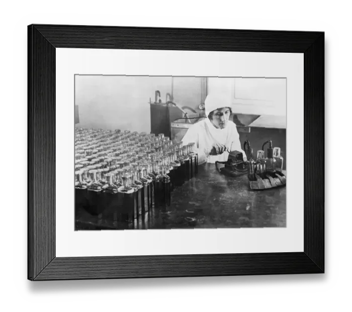Framed Print : Lab Assistant Filling Specimen Bottles Framed Print : Lab Assistant Filling Specimen Bottles
