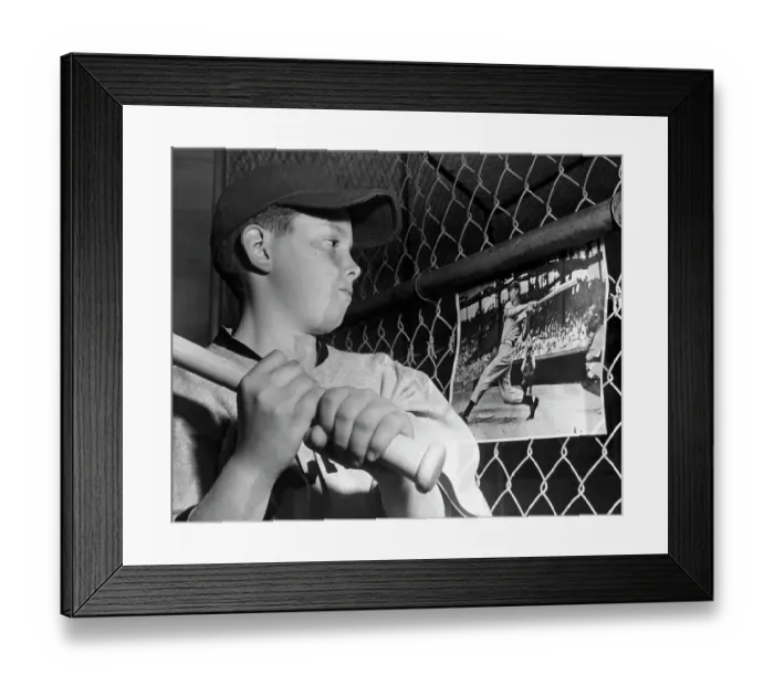 Framed Print : Boy W / Bat Looks At Photo Of Joe Dimaggio Framed Print : Boy W / Bat Looks At Photo Of Joe Dimaggio