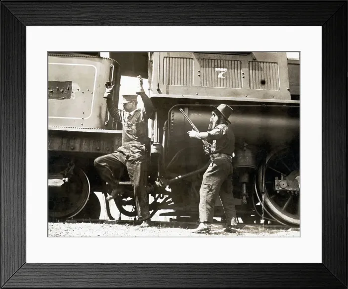 Framed Print : Outlaw Holds Rifle To Train Engineer