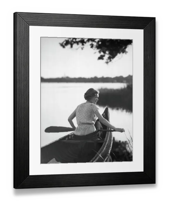 Framed Print : Women Holds Paddle While In Canoe Framed Print : Women Holds Paddle While In Canoe