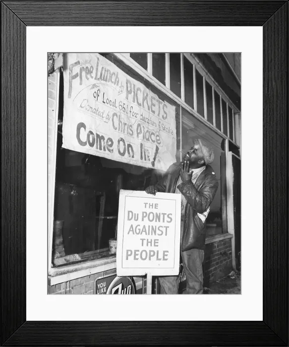 Framed Print : Man Holds Anti-Dupont Sign Before Diner Framed Print : Man Holds Anti-Dupont Sign Before Diner