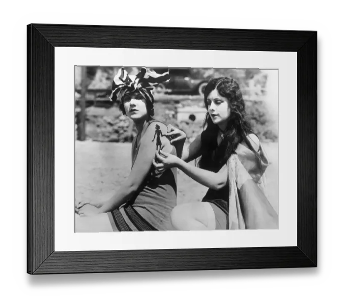 Framed Print : Two young women playing with sunlight Framed Print : Two young women playing with sunlight