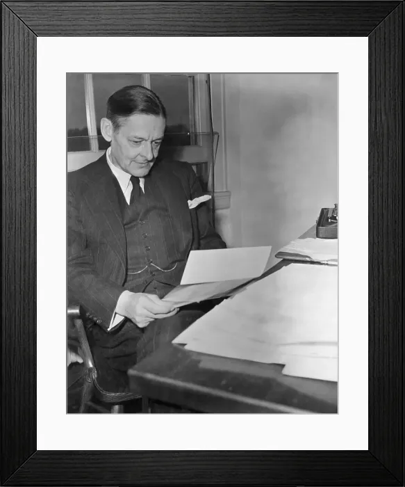 Framed Print : Poet T.S. Eliot Reading a Manuscript Framed Print : Poet T.S. Eliot Reading a Manuscript