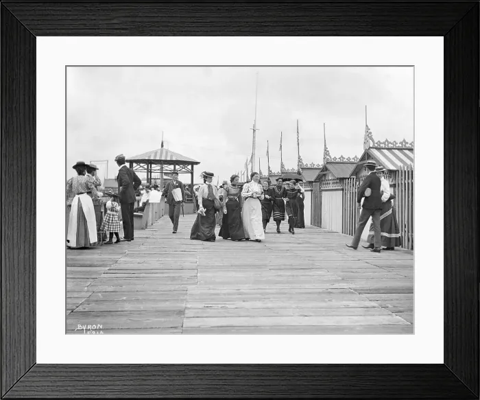 Framed Print : People Strolling on Boardwalk Framed Print : People Strolling on Boardwalk