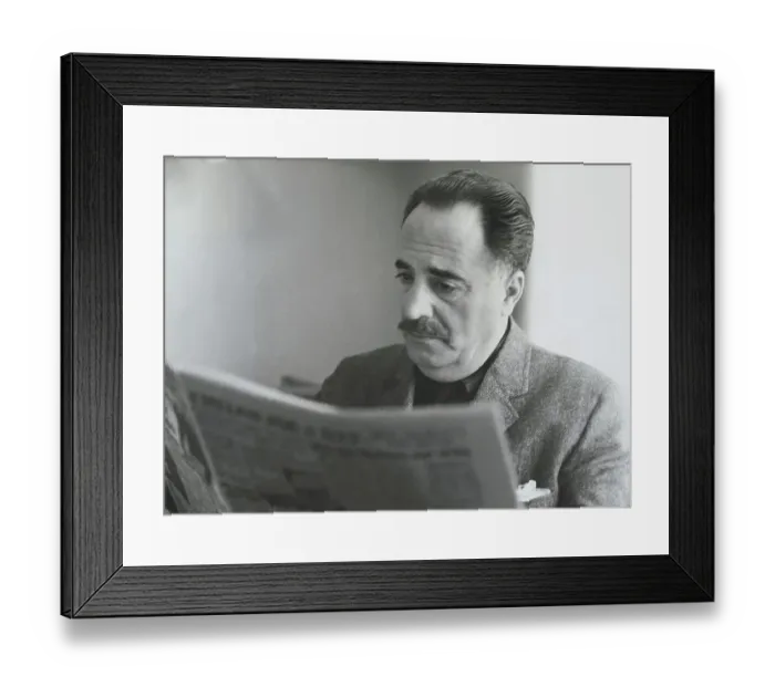 Framed Print : William Saroyan Reading Newspaper Framed Print : William Saroyan Reading Newspaper