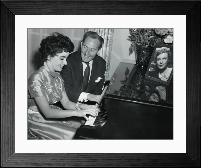 Framed Print : Michael Wilding & Liz Taylor Play Piano Framed Print : Michael Wilding & Liz Taylor Play Piano