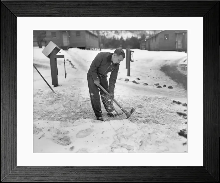 Framed Print : Man Breaking Ice With a Pickaxe Framed Print : Man Breaking Ice With a Pickaxe