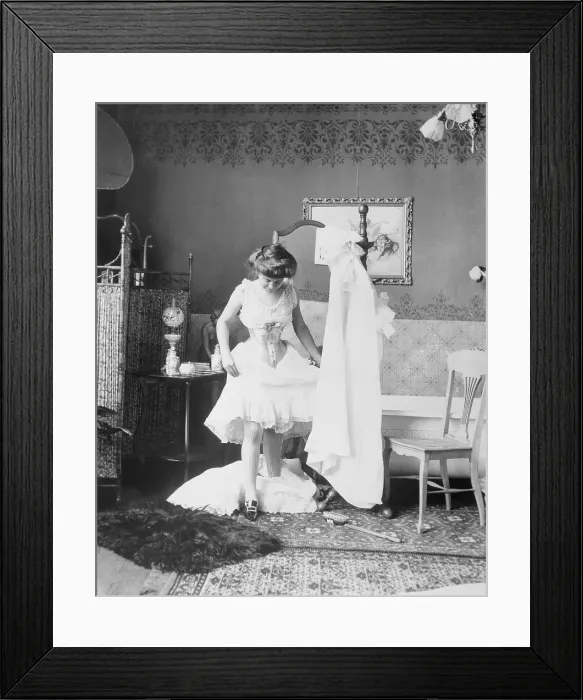 Framed Print : Victorian Woman Undressing in the Bath Framed Print : Victorian Woman Undressing in the Bath