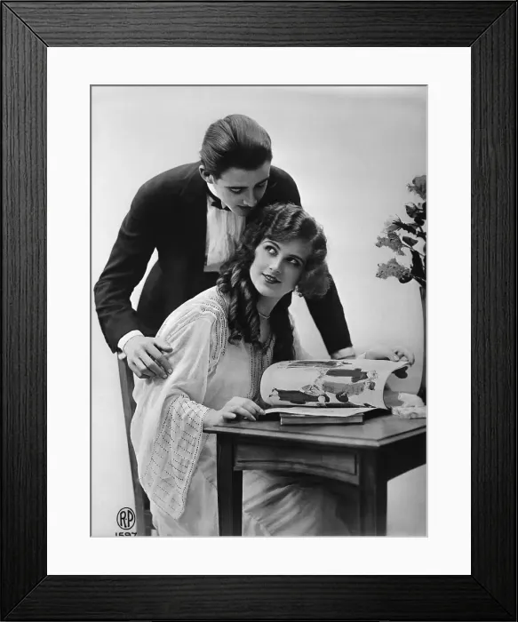 Framed Print : Husband Looking over Wife's Shoulder Framed Print : Husband Looking over Wife's Shoulder
