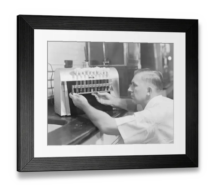 Framed Print : Worker Testing Penicillin Cultures Framed Print : Worker Testing Penicillin Cultures