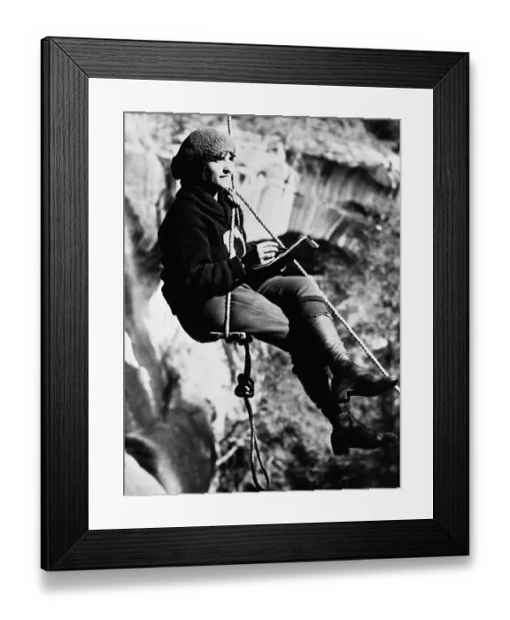 Framed Print : Lady Mountaineer Sketching on Rope Swing Framed Print : Lady Mountaineer Sketching on Rope Swing