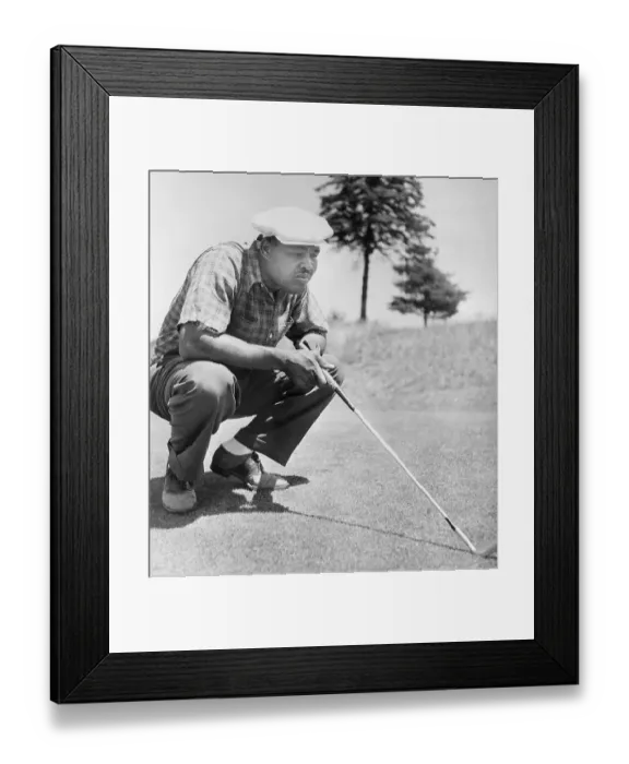 Framed Print : Joe Louis Stooping to Examine Golf Strategy Framed Print : Joe Louis Stooping to Examine Golf Strategy