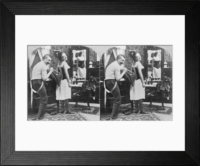 Framed Print : Man Lacing Womans Corset Framed Print : Man Lacing Womans Corset