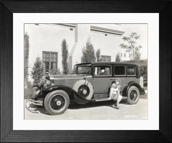 Framed Print : Clara Bow Sitting on Automobile Running Board Framed Print : Clara Bow Sitting on Automobile Running Board