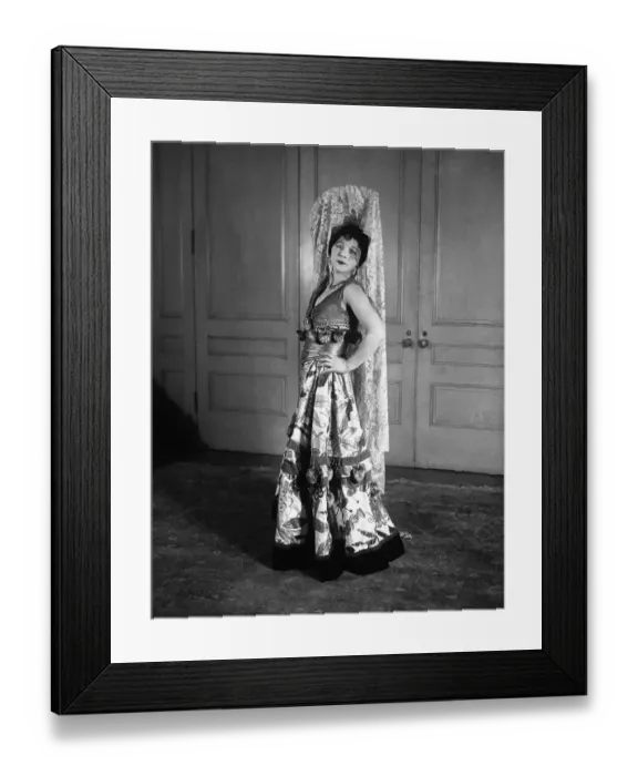 Framed Print : Studio shot of woman wearing costume Framed Print : Studio shot of woman wearing costume