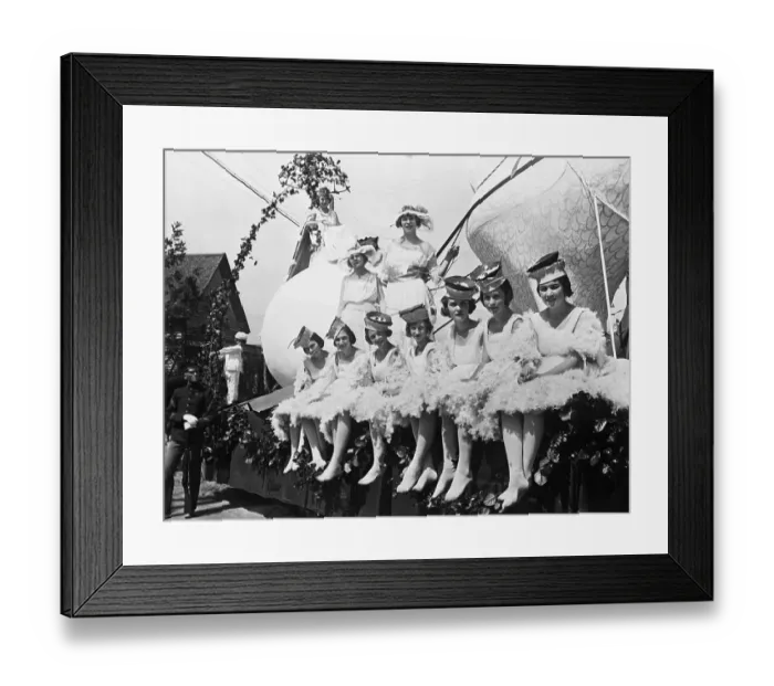 Framed Print : Portrait of young women on parade trailer