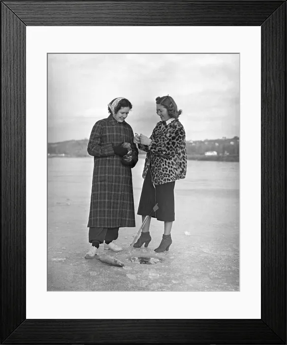 Framed Print : Women ice fishing Framed Print : Women ice fishing
