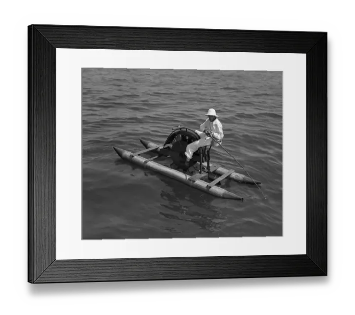 Framed Print : Man on paddleboat fishing Framed Print : Man on paddleboat fishing