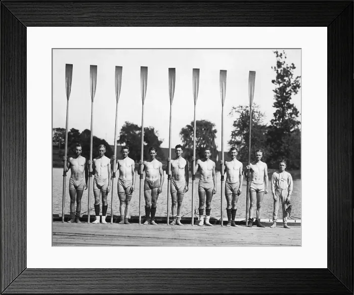 Framed Print : Teammates Posing With Oars On Dock