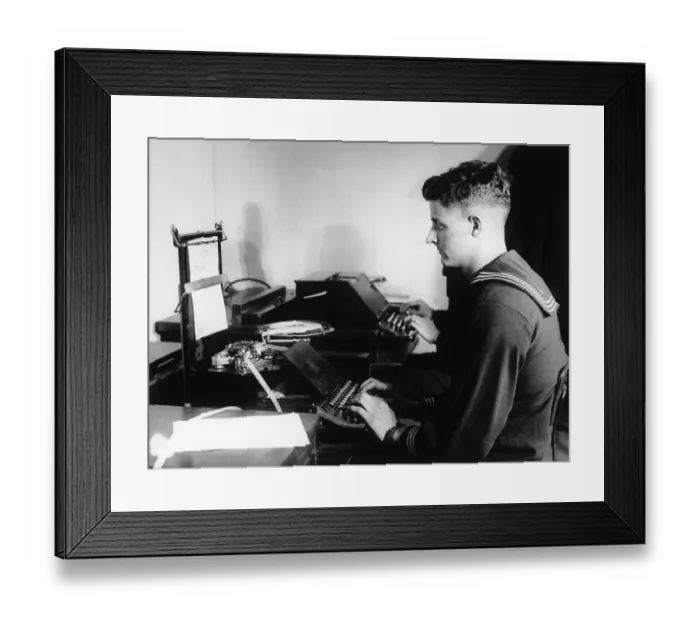 Framed Print : Sailor Sits Typing Out Message At Sea Framed Print : Sailor Sits Typing Out Message At Sea