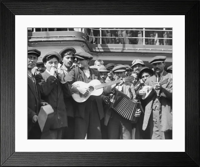 Framed Print : Immigrants in Route to America Playing Music Framed Print : Immigrants in Route to America Playing Music