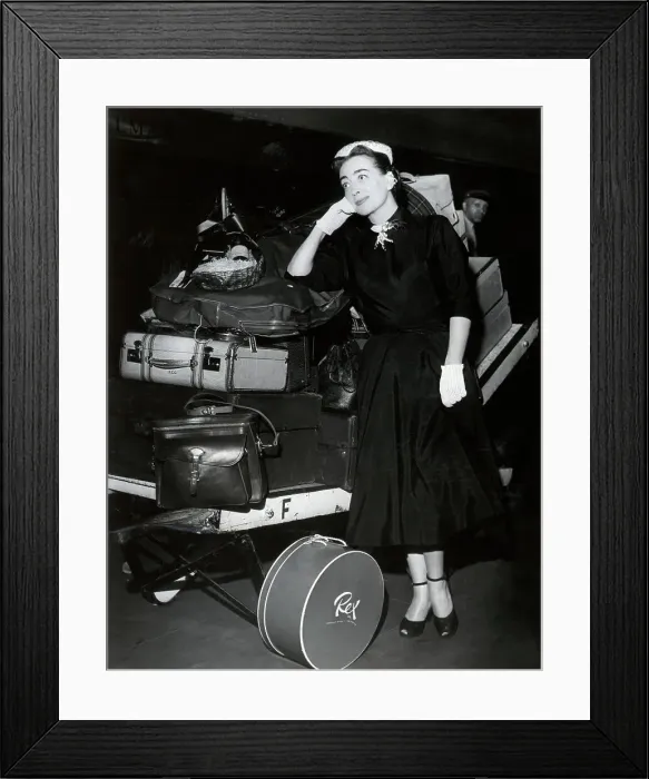 Framed Print : Joan Crawford Stands W / Lots Of Luggage Framed Print : Joan Crawford Stands W / Lots Of Luggage