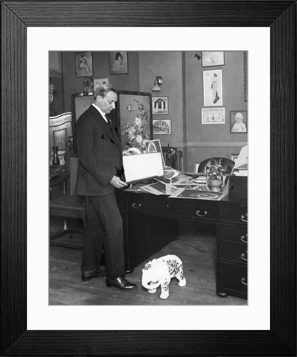 Framed Print : Florenz Ziegfeld Looking At Photographs Framed Print : Florenz Ziegfeld Looking At Photographs