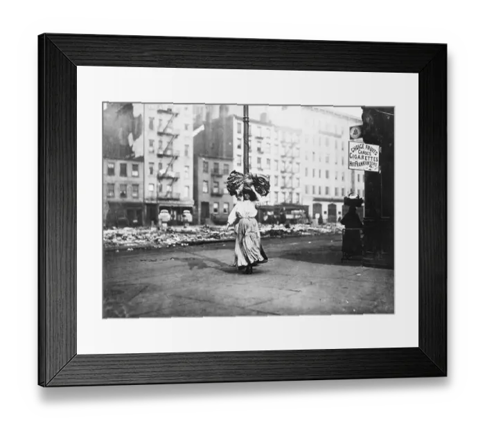 Framed Print : Woman Carrying Bundle Of Clothes On Head Framed Print : Woman Carrying Bundle Of Clothes On Head