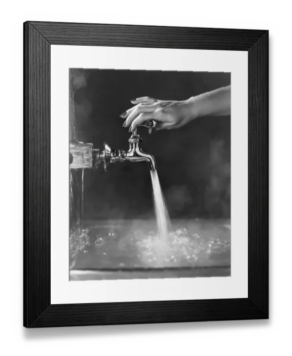 Framed Print : Faucet Being Adjusted By Womans Hand Framed Print : Faucet Being Adjusted By Womans Hand