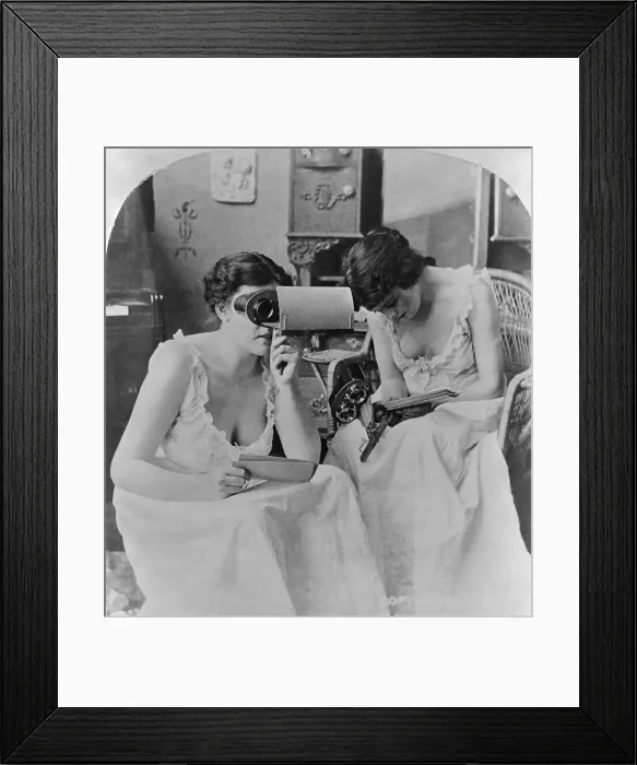 Framed Print : Two Young Women Studying Stereopticon Pictures Framed Print : Two Young Women Studying Stereopticon Pictures