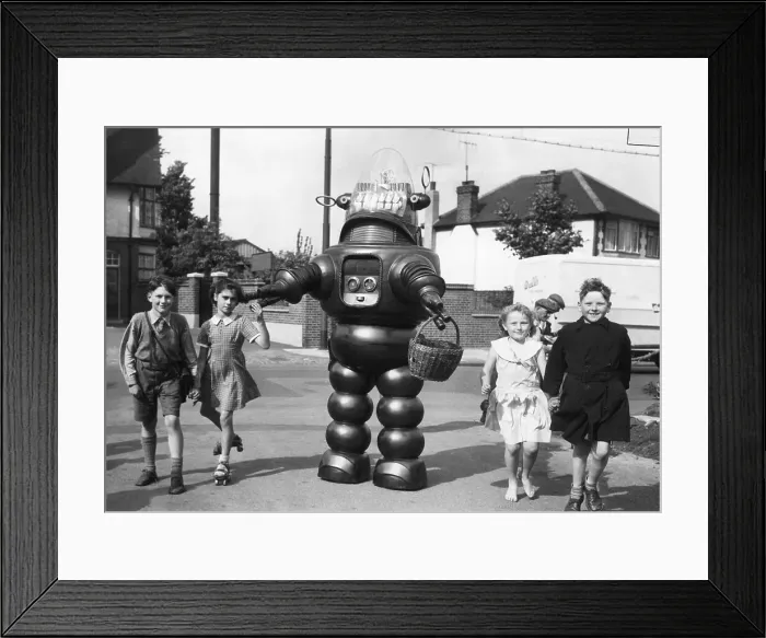 Framed Print : Robby the Robot Walks with Children Framed Print : Robby the Robot Walks with Children