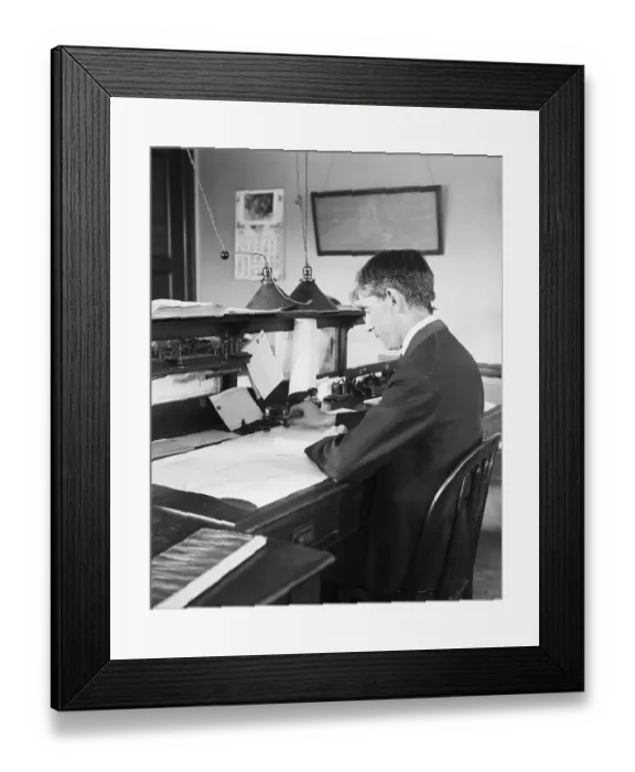 Framed Print : Telegraph Operator Seated At Desk Framed Print : Telegraph Operator Seated At Desk