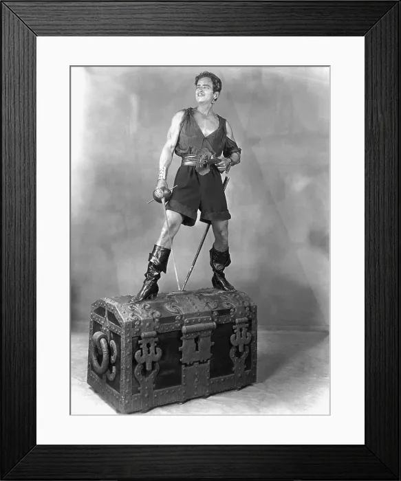 Framed Print : Douglas Fairbanks Standing on Chest Framed Print : Douglas Fairbanks Standing on Chest